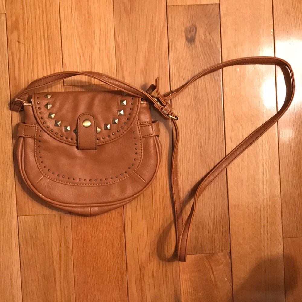 Tan faux leather studded crossbody bag.